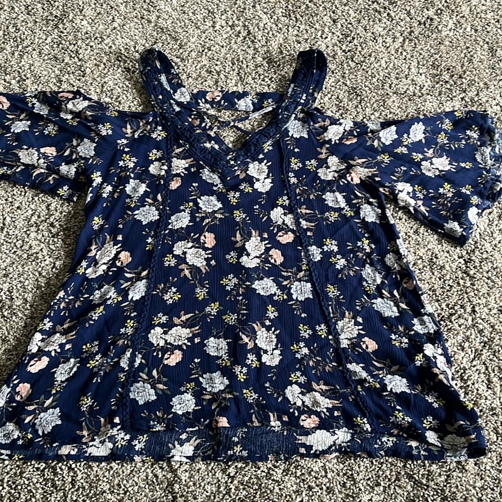 Rayon blouse. Openings in the shoulder area.